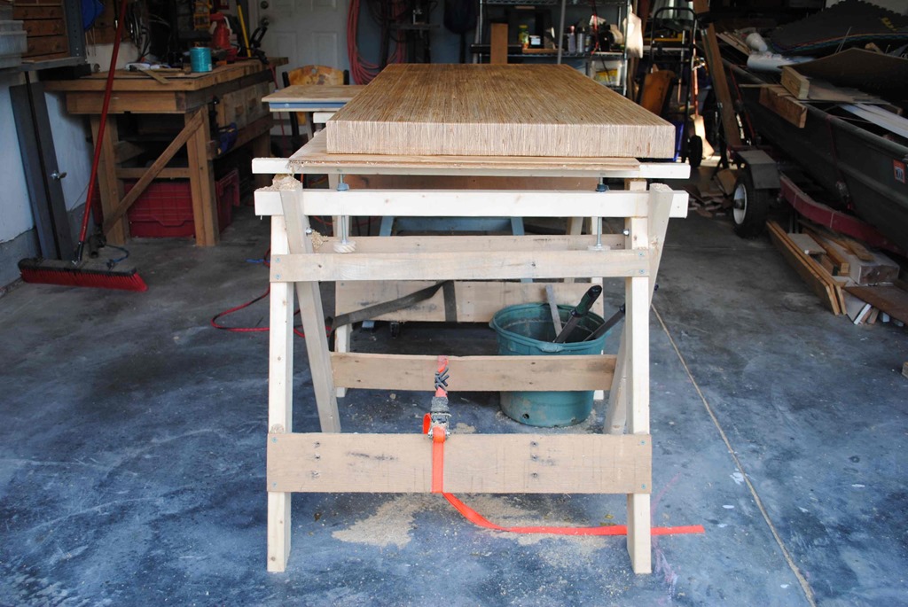 3 inch thick work bench top sitting on adjustable height saw horses