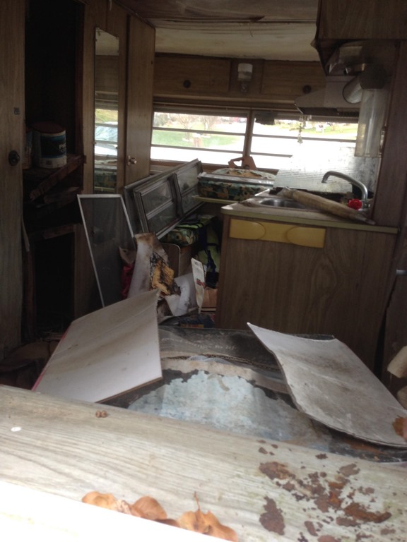 inside view of rotted out camper