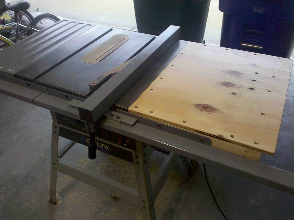 table saw with wooden wing side extension platform