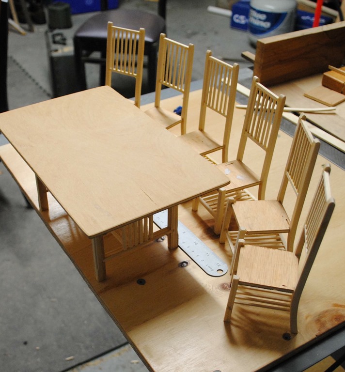 scale table and chairs before finish or seat cushions are applied