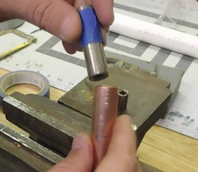 socket that fits perfectly in the ID of the copper tube with blue tape marking the depth to insert