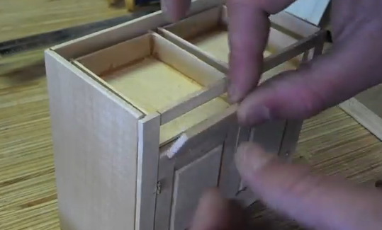 Fitting the drawer front