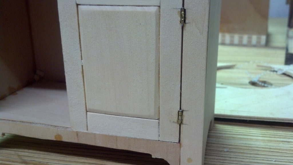 hinges installed on scale cabinet door
