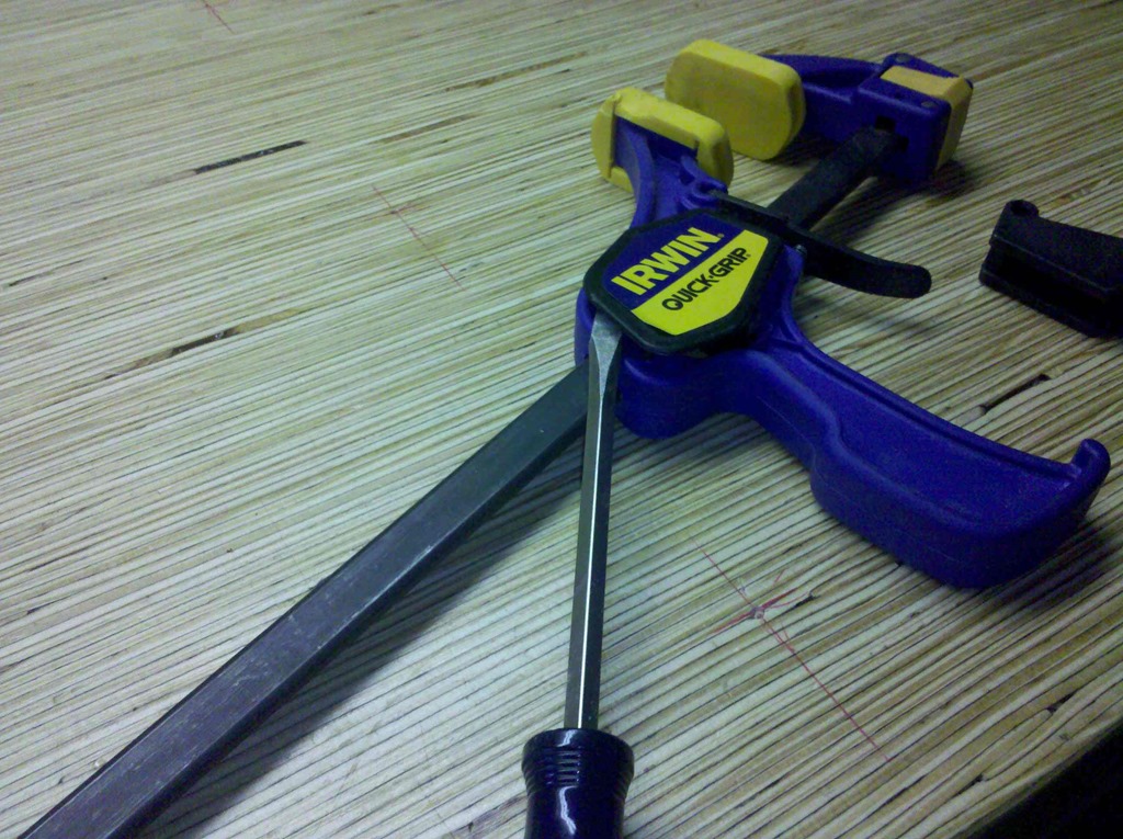 Plastic side cover removed from the Irwin Quick Grip clamp