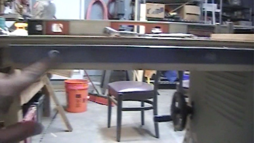 two additional holes drilled in tablesaw frame to accomadate the new wooden side extension
