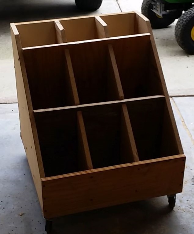 Empty wood storage bin for workshop cutoffs